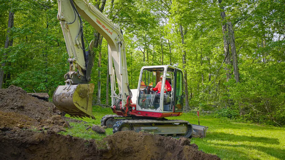 Drainworks mini excavator at work
