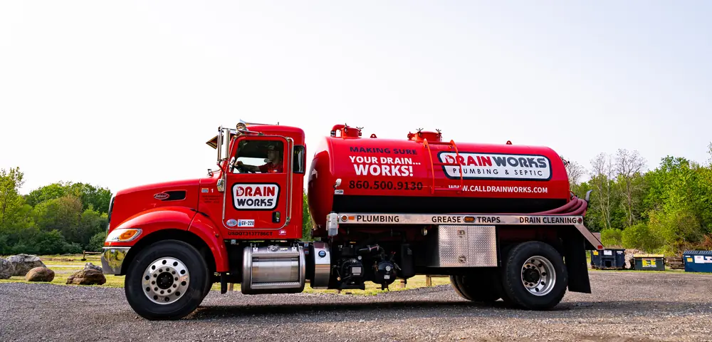 Drainworks red septic tanker truck