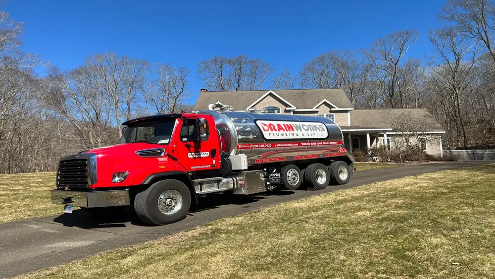 Drainworks septic pump truck parked in a driveway in eastern Connecticut